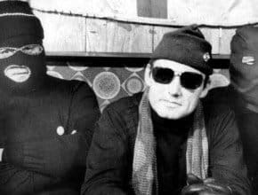 The mythical Orange Pimpernel: Gusty Spence flanked by other UVF men